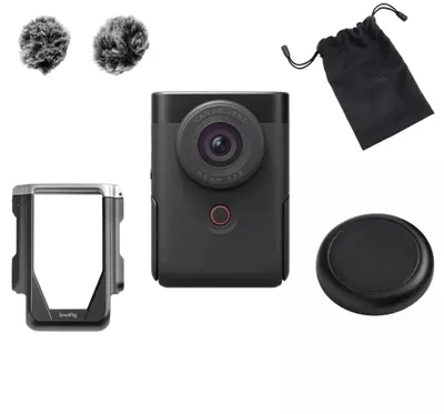 A collection of camera accessories, including a camera, a protective cage, two microphone windscreens, a drawstring bag, and a lens cap, arranged on a white background.