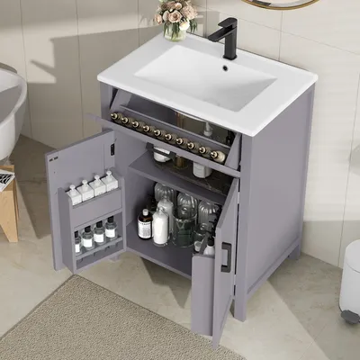 A bathroom vanity with a sink and storage compartments.