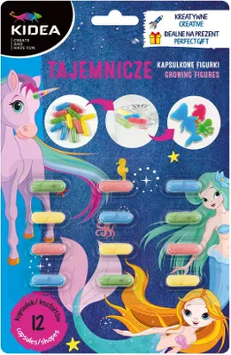 The image shows a blister pack of Kidea growing figures, featuring a unicorn and mermaids. The packaging illustrates the concept of capsules that expand into figures when placed in water.