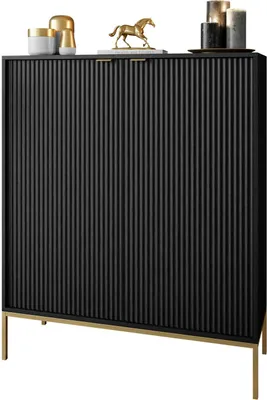A black cabinet with gold accents and decorative items on top.