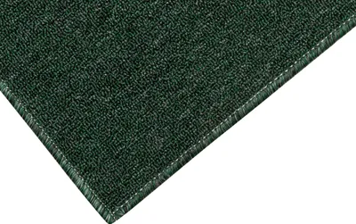 A close-up view of a dark green carpet with a stitched edge, placed on a white background.