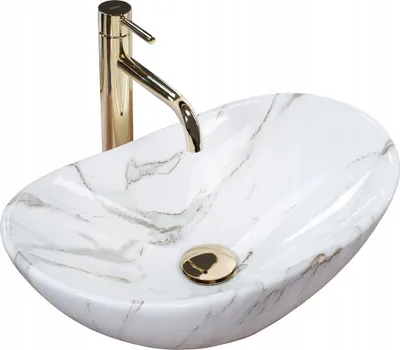 A white ceramic washbasin with marble-like gray veining and a gold faucet, presented on a white background.