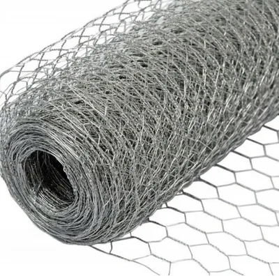 A roll of galvanized hexagonal wire mesh, commonly known as chicken wire.