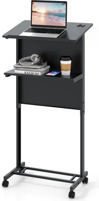 A black mobile lectern with a laptop, books, headphones, and a coffee cup on it, set against a white background.