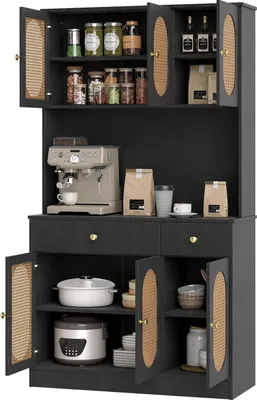 A black kitchen cabinet with various items on its shelves and inside its compartments.