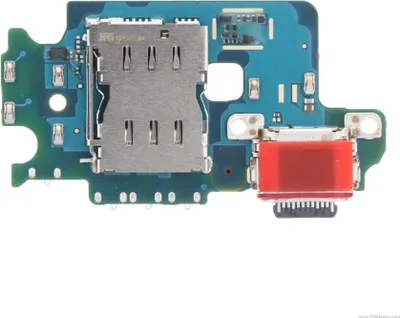 A close-up, top-down view of a smartphone charging port and SIM card tray assembly on a white background.