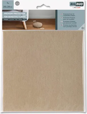 Product packaging with an image of the product in use on a floor.