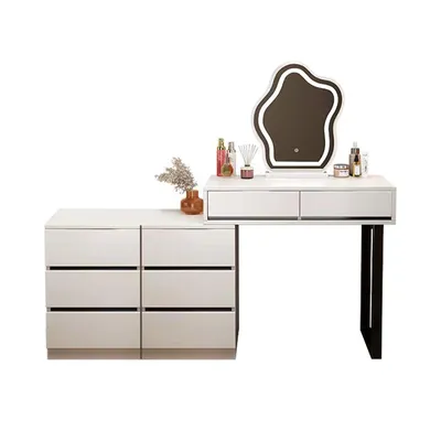 A white dressing table with a mirror and drawers, set against a white background.