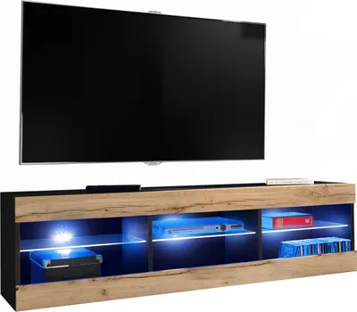 A modern TV stand with LED lighting and a large flat-screen TV mounted above it.
