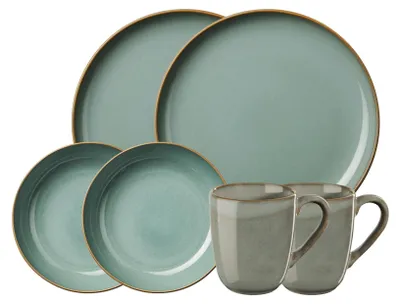A set of tableware including plates and mugs.
