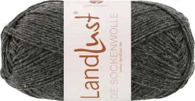 A ball of grey yarn with a label.