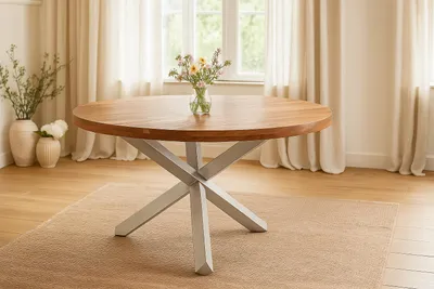 Produktbild von Refurbished Möbelretoure Esstisch rund Ø 140 cm Akazie natur massiv Sternfuß-Gestell silber RUNA