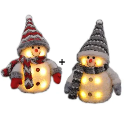 Two illuminated snowman figures with hats and scarves.
