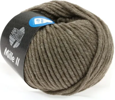 A ball of taupe-colored yarn with a label wrapped around it.