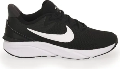 A black Nike Star Runner 4 sneaker with a white Nike swoosh logo is shown from the side against a white background.