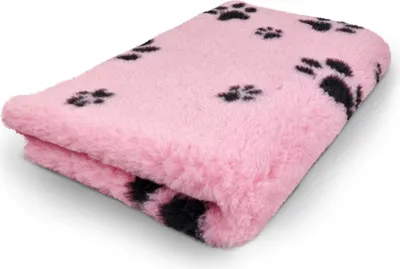 A folded pink pet blanket with black paw prints on a white background.