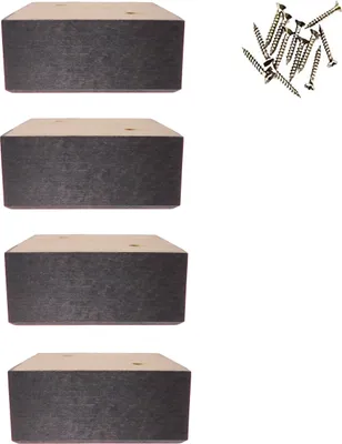 Four wooden furniture feet and a pile of screws on a white background.