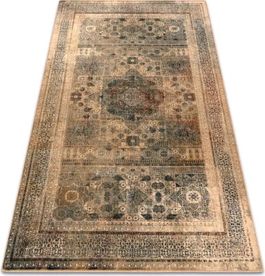 A Persian-style rug with intricate patterns in cream, beige, and dark blue.