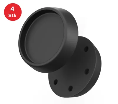 A set of four black anti-vibration pads for a washing machine.