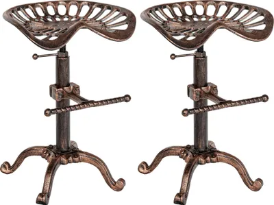 Two bronze-colored tractor seat bar stools are shown against a white background.