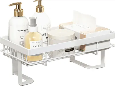 A white shower caddy filled with various bath and beauty products.