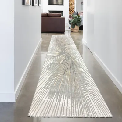 Image de Un tapis avec des motifs abstraits et des fibres brillantes argent-bronze Taille - 80 x 300 cm