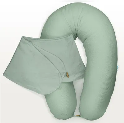 A green, ribbed U-shaped nursing pillow with a detachable cover.