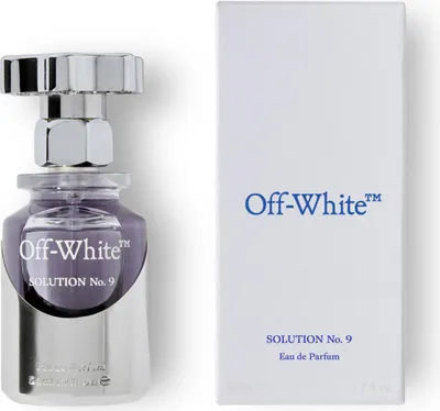 A perfume bottle and its packaging are displayed against a white background.