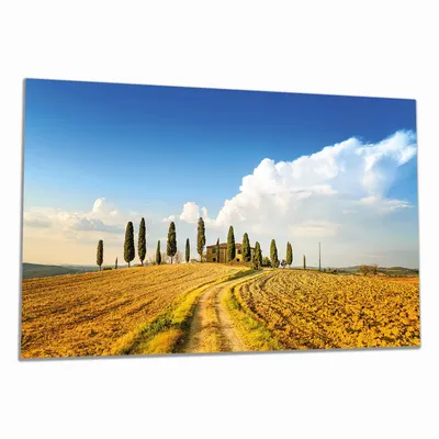 Produktbild von Wallario Herdabdeckplatte aus Glas, Größe 90 x 52 cm 1-teilig, Motiv Italien - Toskana unter blauem Himmel  einsame Farm
