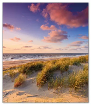 Produktbild von Wallario Herdabdeckplatte aus Glas, Größe 52 x 60 cm 1-teilig, Motiv Abendspaziergang am Strand - Sonnenuntergang über dem Meer