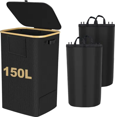 A black laundry basket with a lid and bamboo frame, shown with two smaller black cylindrical containers behind it.