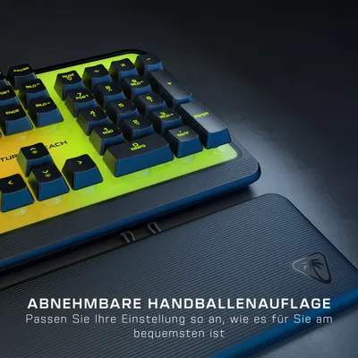A close-up of a gaming keyboard with a detachable wrist rest.