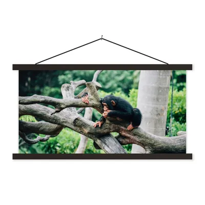 Produktbild von MuchoWow® Textilposter Junger Schimpanse im Dschungel 60x30 cm mit schwarzem Rahmen - Textilien