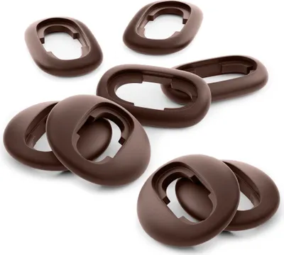 A collection of brown silicone earbud tips arranged on a white background.
