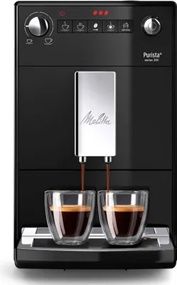 A black Melitta Purista coffee machine is shown from the front, with two cups of espresso being dispensed.