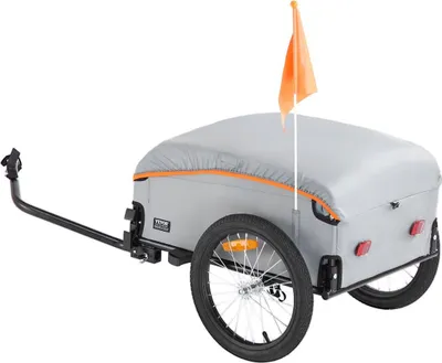 Image de Remorque pour vélo, capacité de charge de 100 lb, chariot robuste pour vélo, rangement compact et pliable avec attelage universel, housse imperméable, roues de 16 pouces, réflecteurs de sécurité, compatible avec les roues de vélo de 22 à 28 pouces.