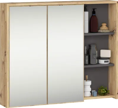 A bathroom cabinet with mirrored doors and open shelving displaying toiletries.