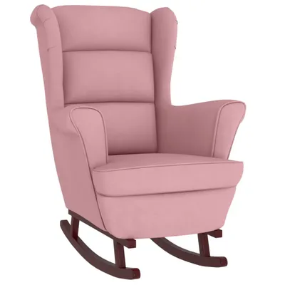 A pink velvet rocking chair with wooden rockers, presented against a white background.