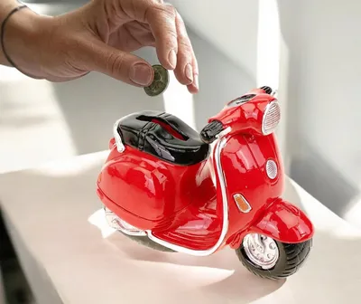 Produktbild von Kremers Schatzkiste Spardose Motorroller Handbemalte Sparbüchse Roller 10x15x8cm