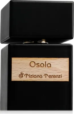 A close-up shot of a black perfume bottle with a wooden label.