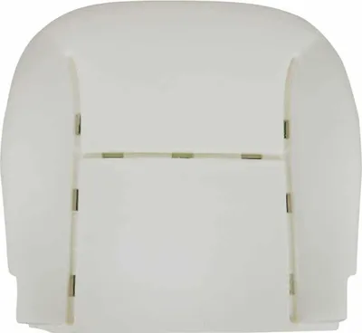 A white foam seat cushion for a car.