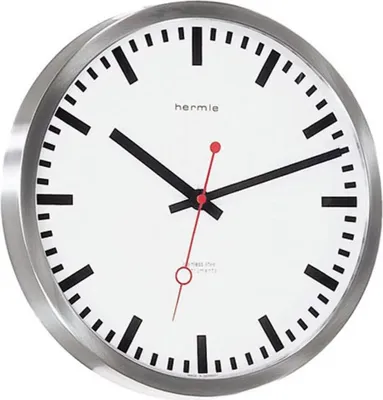 A close-up, studio shot of a wall clock.
