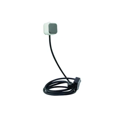 A white background with a product consisting of a small white cube with a gray face and a black cable.