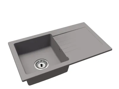 A single kitchen sink with a drainboard, shown from a diagonal angle against a white background.