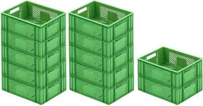 Three stacks of green plastic crates against a white background.
