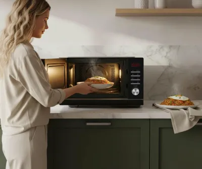 Produktbild von Tomado TMC2302B Kombi-Mikrowelle mit Grill & Heißluft - 23 Liter - Schwarz