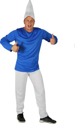 A man wearing a blue shirt and white pants with a white pointed hat, giving a thumbs up.