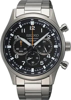 A close-up studio shot of a Seiko chronograph watch with a black dial and silver metal band.