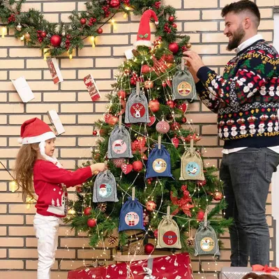 Productafbeelding van Adventskalender om te vullen met 24 adventsgetallen - Stickers - Jutezakjes - Doe-het-zelf - Kleine kerstkalender