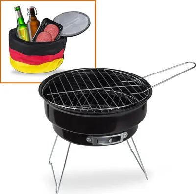 A black portable grill with a cooler bag featuring the German flag colors, containing drinks and food.